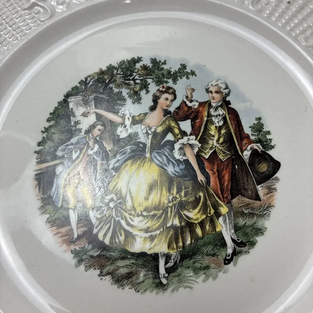 This Vogue Dinnerware Washington Colonial pattern plate with a courting couple
